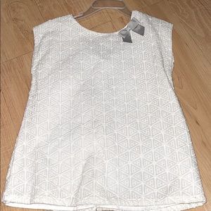 A White blouse with ribbons